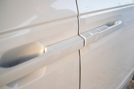 Keyless entry on a white car.