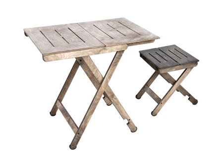 Wooden folding table and chair. On a white background.の写真素材