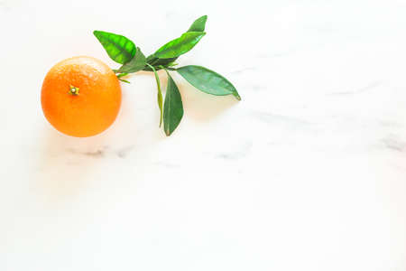 orange on white background Half an orange and orange juice.の写真素材