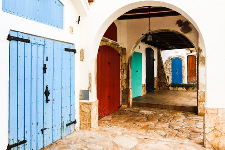 Fishing village located on the Costa Brava. Picturesque town with doors and windows of many colors.の写真素材