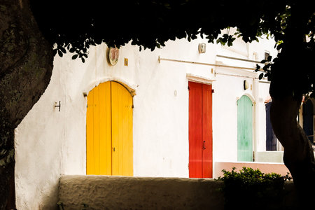 Fishing village located on the Costa Brava. Picturesque town with doors and windows of many colors.の写真素材