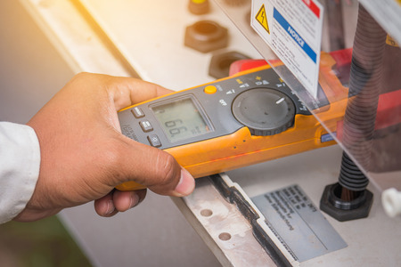 an engineer working on checking and maintenance equipment in solar power plant