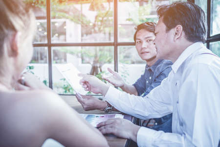 people in office talking and working about business strategy to profit upの写真素材