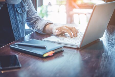 Businessman review ideas and planning project to investment at coffee cafe.