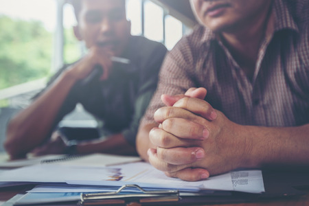 businessman feeling worried and tired on business unsuccessfulの写真素材