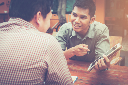 businessteam discussing ideas and planning about profits summaryの写真素材