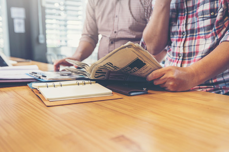 businessteam discussing ideas and planning about profits summaryの写真素材