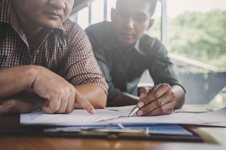 businessman feeling worried and tired on business unsuccessfulの写真素材