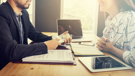 Business negotiation concept; Business people handshaking to sign contract of business
