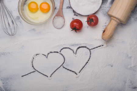 baking ingredients eggs, flour, sugar, butter, yeast. dough preparation. food backgroundの写真素材