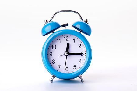 Close-up of Pink Table Alarm Clock on White Background