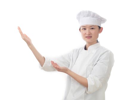Chef woman. Baker. Isolated on white background.の写真素材