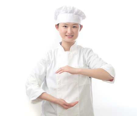 Chef woman. Baker. Isolated on white background.の写真素材