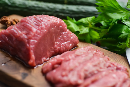 Raw beef meat on a cutting boardの写真素材