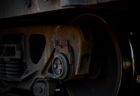 A closeup view of the wheels of a train