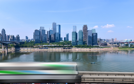 light rail moving on railway in chongqingの写真素材