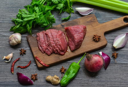 Raw beef meat on a cutting boardの写真素材