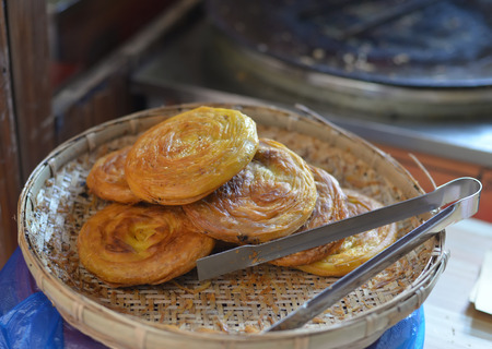 Fried pastry in a basketの写真素材