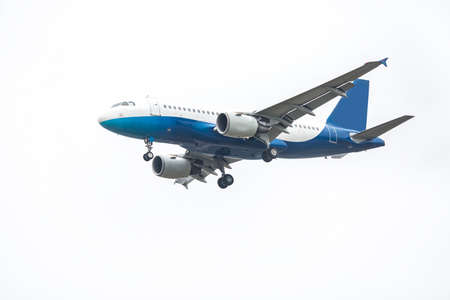 Place flying in sunset skyのeditorial素材