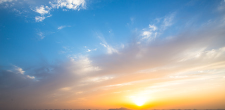 Big sunset and red lighting skyの写真素材