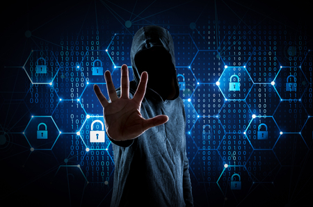Young hacker in data security conceptの写真素材