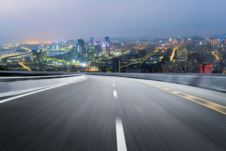 empty highway with cityscape and skyline of shenzhen,China.の写真素材