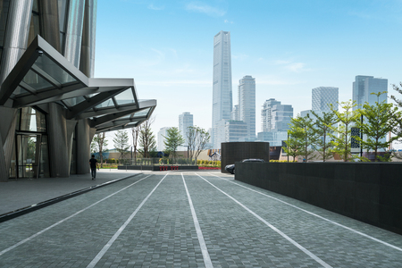 Panoramic skyline and buildings with empty concrete square floor in shenzhen,chinaのeditorial素材