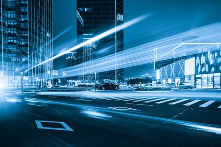 abstract image of blur motion of cars on the city road at night,Modern urban architectureのeditorial素材
