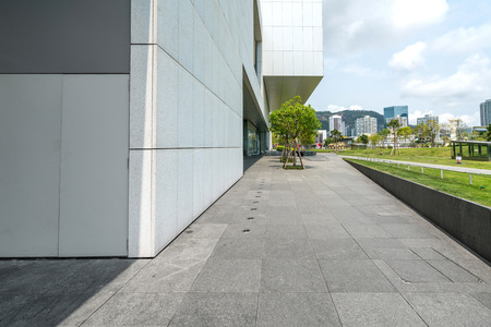 Panoramic skyline and buildings with empty concrete square floor in shenzhen,chinaのeditorial素材