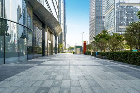 Panoramic skyline and buildings with empty concrete square floor in shenzhen,chinaの写真素材