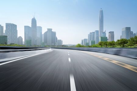 empty highway with cityscape and skyline of shenzhen,China.の写真素材