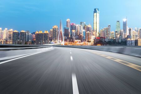 The expressway and the modern city skyline are in Chongqing, China.の写真素材