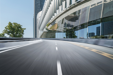 Empty road floor surface with modern city landmark buildings of hangzhou bund Skyline,zhejiang,chinaのeditorial素材