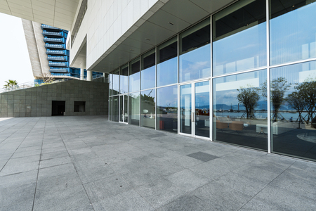 Panoramic skyline and buildings with empty concrete square floor in shenzhen,chinaのeditorial素材