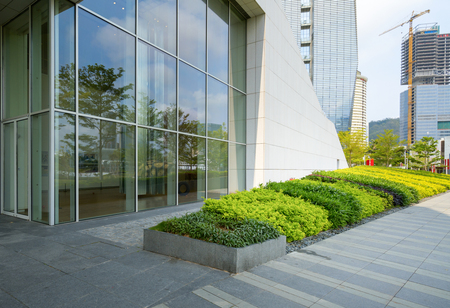 Panoramic skyline and buildings with empty concrete square floor in shenzhen,chinaのeditorial素材