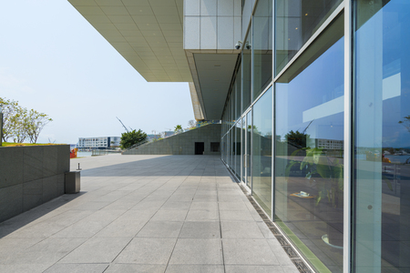 Panoramic skyline and buildings with empty concrete square floor in shenzhen,chinaのeditorial素材