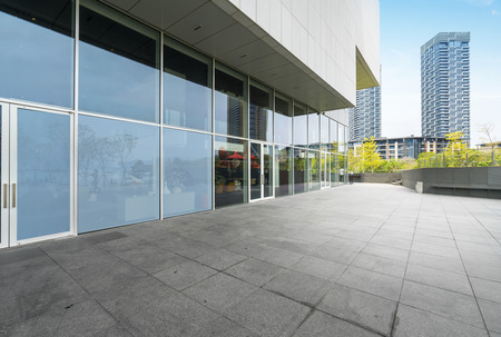 Panoramic skyline and buildings with empty concrete square floor in shenzhen,chinaのeditorial素材