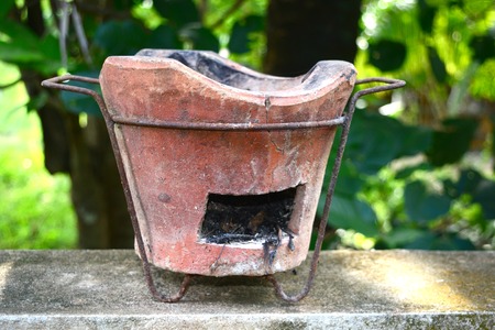 the old cooker on cement groundの写真素材