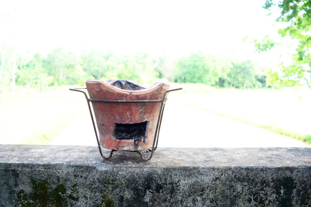 the old cooker on cement groundの写真素材