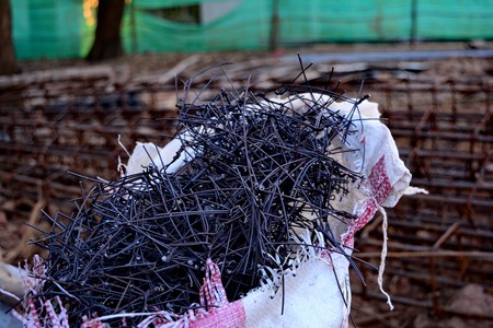 fraction wire  overflow a bag  in contruction siteの写真素材