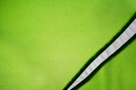 the fiber texture of old green sport shirt