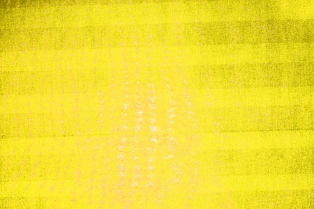 the fiber texture of shirt with yellow light  backgroundの写真素材