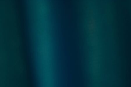 the blurred of deep blue hexagon  backgroundの写真素材