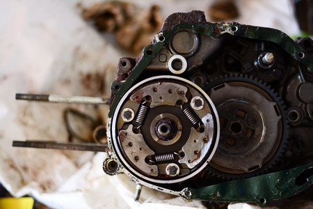 the parts of old motorcycles engine at the repair shopの写真素材