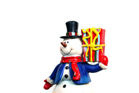snowman with gift box on white background isolatedの写真素材