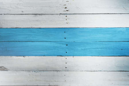 vintage background,the texture of blue  and white color on wood tableの写真素材