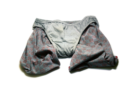 stack of grey cotton boxer with panty on white background isolatedの写真素材