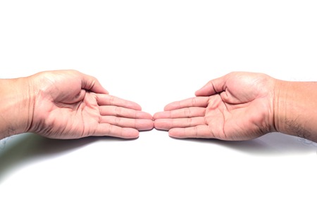 two  hands with  sign of giving on white background isolatedの写真素材