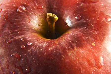 drops of water on an appleの写真素材