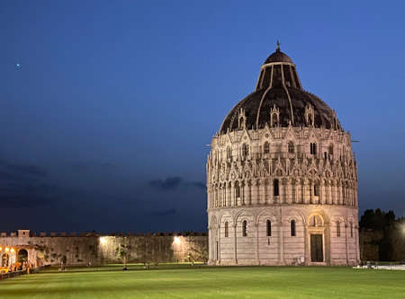 The Baptistery of Pisa at the Piazza dei Miracoli or the Square of Miracles in Pisa, Italyの写真素材